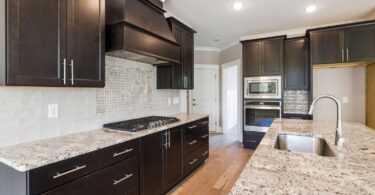 A sleek kitchen showcasing long-lasting surface treatments